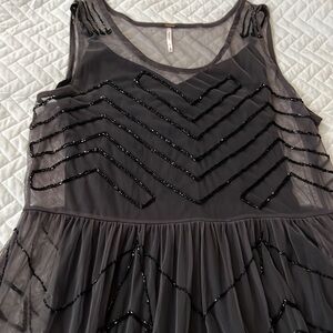 Free people beaded tunic dress with slip included. Size M. New never worn